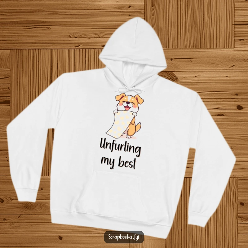 Funny hoodie featuring a joyful dog enthusiastically unfurling a long piece of patterned paper with an impressive flourish.