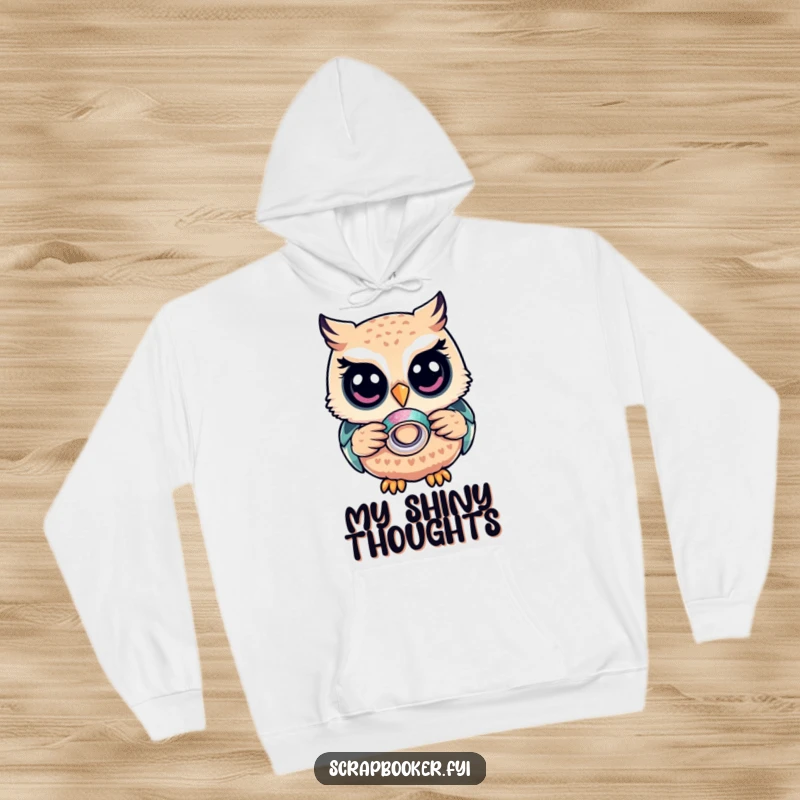 Funny Owl Hoodie: A calm owl holding glitter tape, radiating craftiness, a warm and humorous apparel item for gift-giving.