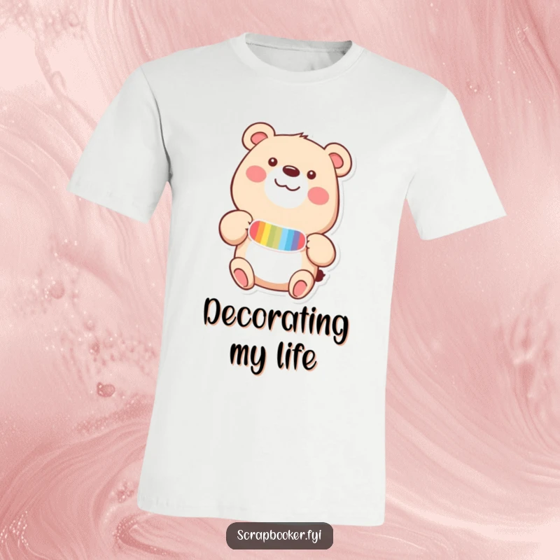 Funny t-shirt with a happy bear adding a colorful sticker to a page with delight, perfect for crafty people.